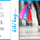 two pairs of ladies legs wearing heels carrying paper bags