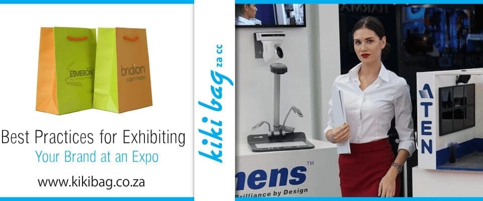a woman manning an exhibition stand