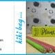 3 plantable pencils next to their box on a countertop in front of a polka dot backdrop