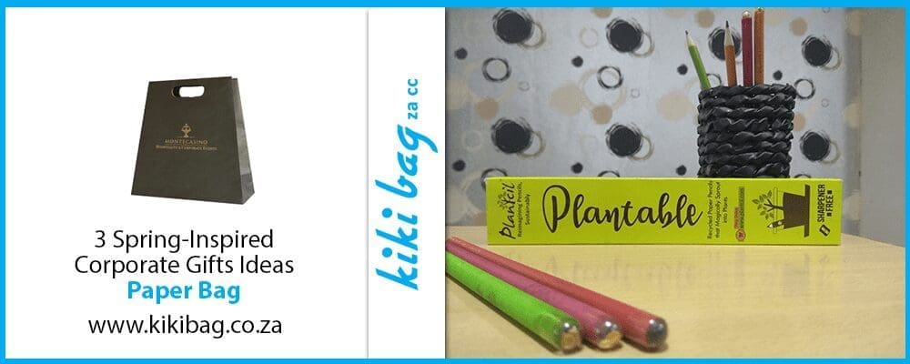 3 plantable pencils next to their box on a countertop in front of a polka dot backdrop